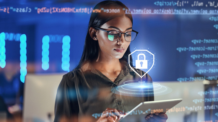 Female using tablet device with padlock symbol